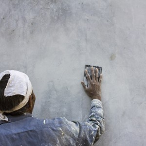 Fine sand paper is used to smoothen the oxide plaster.